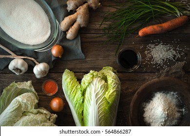 Chinese Cabbage Kimchi And Ingredients On A Wooden Table Horizontal