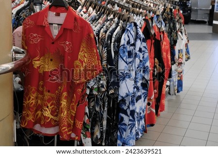 Chinese calendar year of the dragon public market shirt stall and shirts