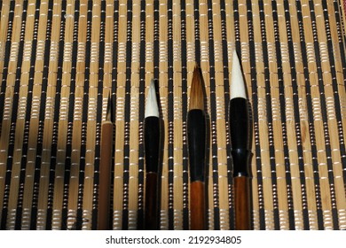 chinese calligraphy brush parallel line close up landscape. Chinese calligraphy brush collection. Mao bi 《毛笔》means brush in chinese. Chinese calligraphy brush is used to do shu fa 《书法》. 