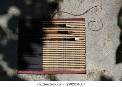 chinese calligraphy brushes set with top view bird eye view and shadows. Chinese calligraphy brush collection. Mao bi 《毛笔》means brush in chinese. Chinese calligraphy brush is used to do shu fa 《书法》. 
