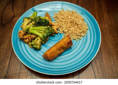 Chinese Chicken And Broccoli With Fried Rice And A Egg Roll