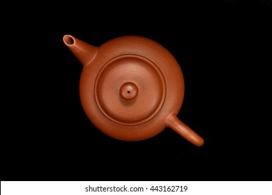 Chinese clay teapot , Isolated on black background , Top view 