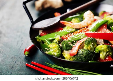 Chinese Cuisine. Colorful Stir Fry In A Wok. Shrimps With Vegetables