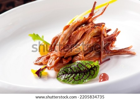 Chinese cuisine, spicy duck tongue.