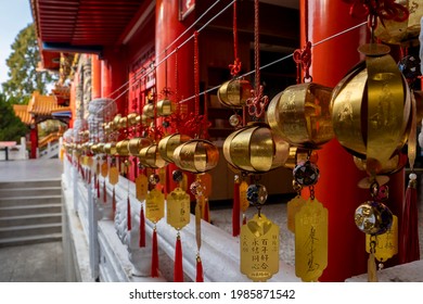 Chinese decorations of small lanterns in a Taiwanese temple. 

Lantern text translate: "Sun Moon Lake. May happiness increase with age and love deepen with time. Went Temple."