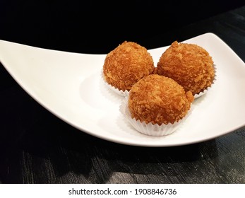 Chinese Dim Sum Crispr Taro Ball Lava In Bamboo Basket. Chinese Foods.