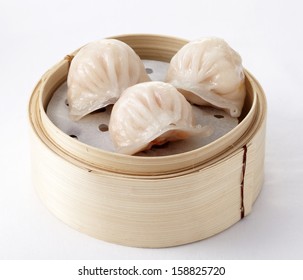 Chinese dim sum 'Hagao' in bamboo basket - Powered by Shutterstock