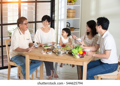 Chinese Family Having Lunch