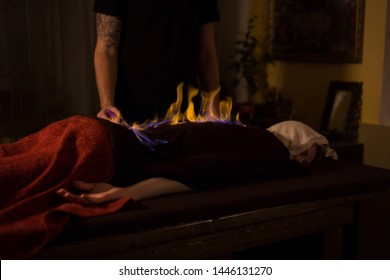 Chinese Fire Massage - Huo Liao Therapy. Traditional Chinese Medicine, Fire Treatment And Bodycare Concept