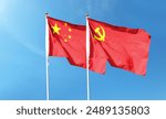 Chinese flag with Chinese Communist Party flag on cloudy sky. flying in the sky