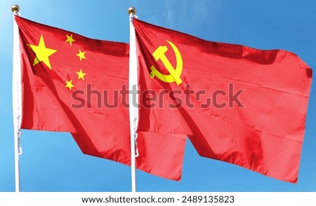Chinese flag with Chinese Communist Party flag on cloudy sky. flying in the sky