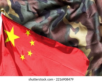 The Chinese Flag And The Physical Version Of The Military Camouflage Uniform. War And Military Symbols Concept Background Banner