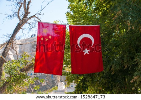 Chinese flag and Turkish flag next to each other