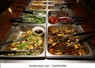 Chinese food buffet with various food in the restaurant
