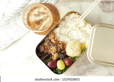 Chinese Food, Dumpling And Stir Fried Chicken In Japanese Bento Lunch Box