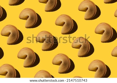 chinese fortune cookies on yellow background