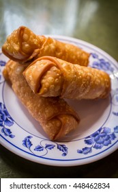 Chinese Fried Crispy Egg Rolls On Fancy Dinner Plate