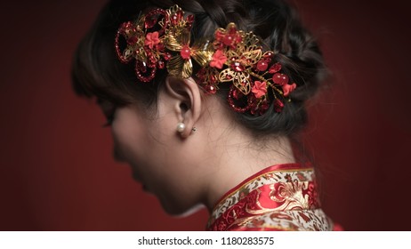 Chinese girl in red 
cheongsam dress - Shutterstock ID 1180283575