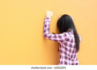 A Chinese Girl Is Very Sad, Faces The Wall