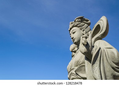 A Chinese Goddess Sculpture With Blue Sky