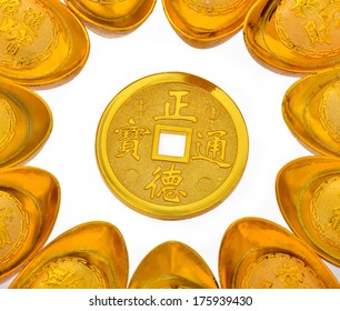 Chinese Gold Ingots And Gold COINS On White Background.