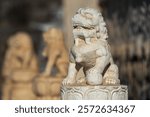 Chinese guardian lions, or imperial guardian lions, are a traditional Chinese architectural ornament. Typically made of stone, they are also known as stone lions or shishi.