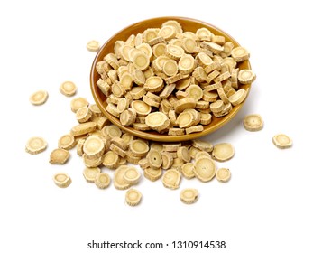 Chinese Herbal Medicine - Astragalus Slices, Huang Qi (Astragalus Propinquus) On White Background 