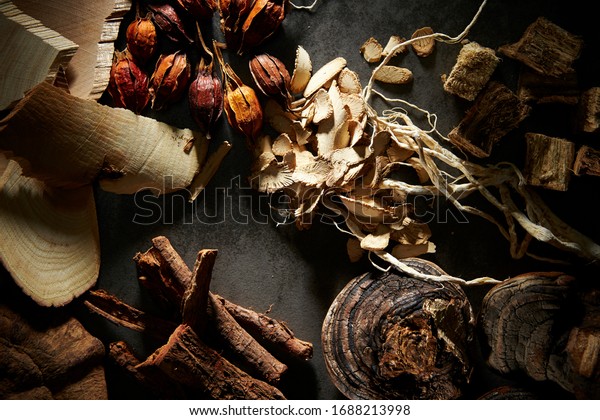 Chinese herbal\
medicine with dramatic lighting\
