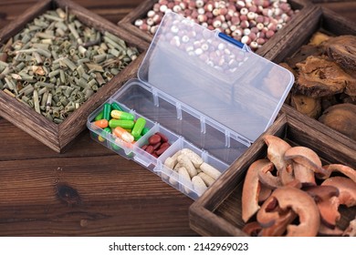 Chinese Herbal Medicine And Western Medicine Pills In Box