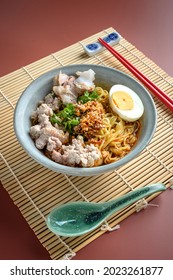 Chinese Or Japanese Famous Traditional Oriental Cuisine, Asian Ramen Noodle With Original Sichuan Chilli Oil, Minced Pork, Boiled Egg Served 