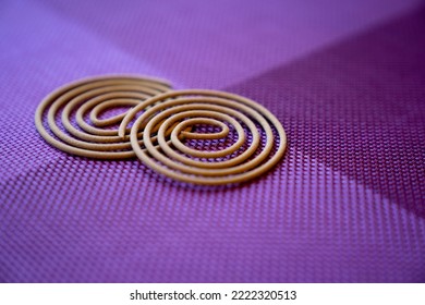 Chinese Joss Sticks On Purple Background