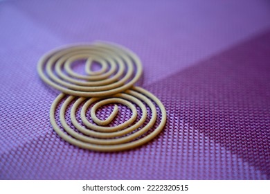 Chinese Joss Sticks On Purple Background