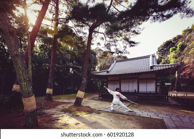 Chinese Lady Was Performing Taiji Sword Dance In A Park