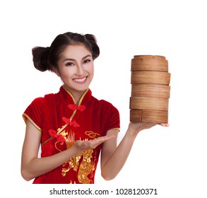 Chinese lady in red chinese dress with dim sum basket on hand on white isolated background