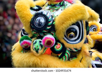 Chinese Lion Dance Costume Close Up With People In Background