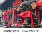 Chinese Lion statue in Wong Tai Sin Temple in Hong Kong, China. The Chinese wording is the name of the temple and not a brand name