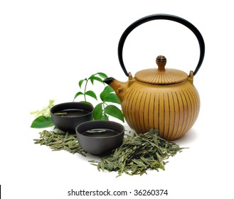 Chinese Long Jing Green Tea With Small Pot And Cups Isolated On White