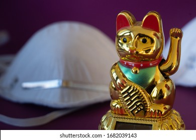 Chinese Lucky Cat And Masks On Purple Background