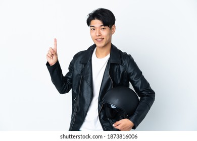 Chinese Man With A Motorcycle Helmet Isolated On White Background Pointing Up A Great Idea