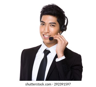 Chinese mixed Indian businessman with headset for hotline job aspect