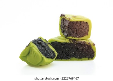 Chinese moon cake green tea flavour with black sesame isolated on white background