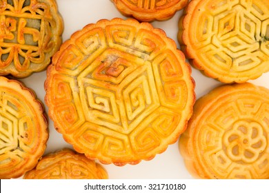 Chinese Moon Cakes Top View Arranged On A White Plate