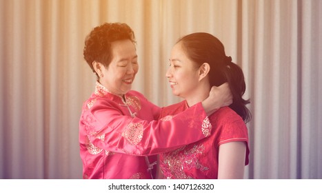 Chinese Mother Give Gift To Daughter In Law On New Year