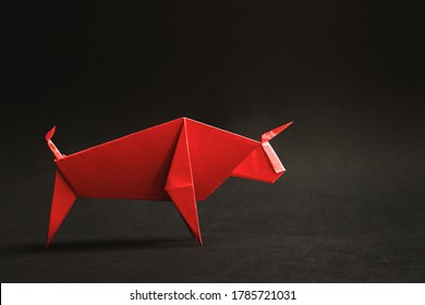 Chinese new year 2021 year of the ox , red. Bull on black background.