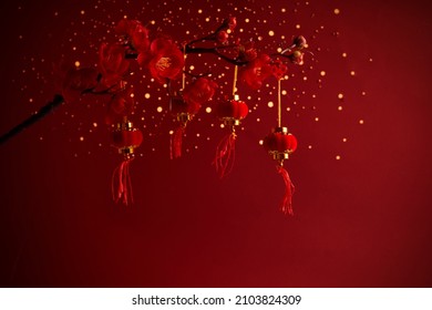 Chinese New Year background with sakura branch and lanterns - Powered by Shutterstock