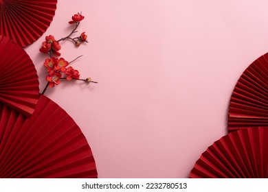Chinese New Year celebration background with red paper fans and flowers. Asia traditional cultural decoration. Empty space. decoration backdrop idea for the year-end party. - Shutterstock ID 2232780513
