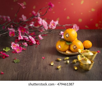 Chinese New Year Tangerine Oranges On Wooden Table Top.