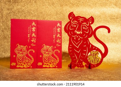 Chinese New Year of Tiger mascot paper cut and red pockets the Chinese means good luck and fortune no logo no trademark