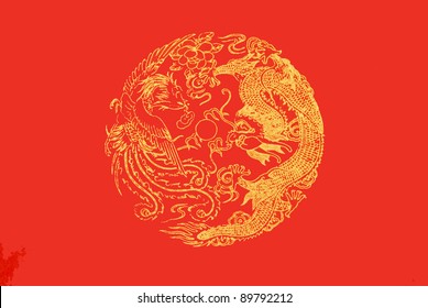 Chinese ornament dragon and phoenix on red paper