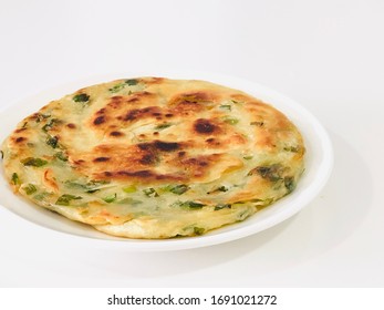 Chinese Pancake with shallot in white plate